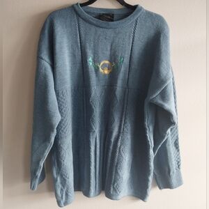 Emerald Isle Made in Ireland Blue Embroidered Claddagh Symbol Cable Knit Sweater